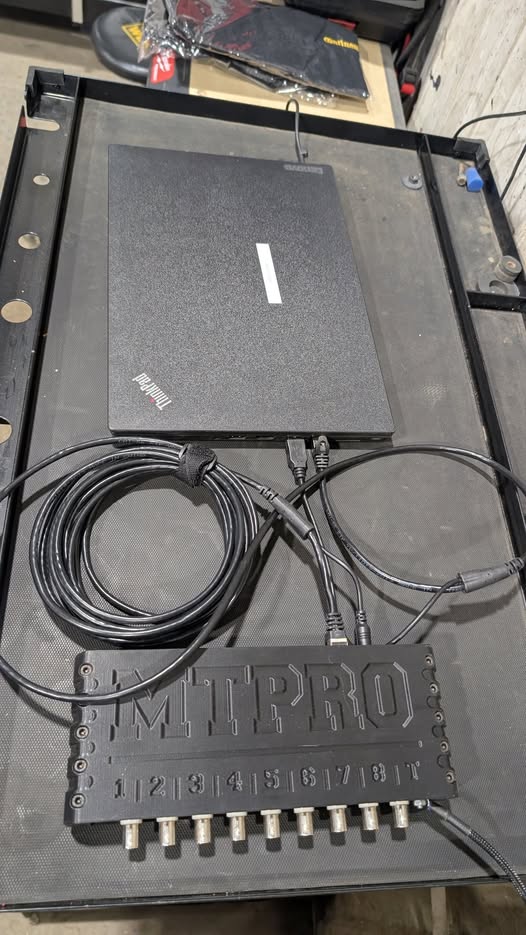 MTPRO multi-channel break-out box wired to a ThinkPad laptop