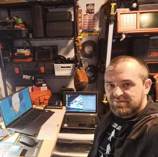 The founder at his workbench — solo tech who built this platform