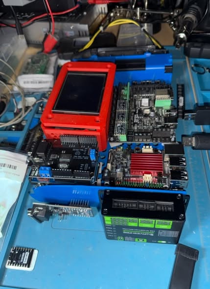 Multi-protocol programmer bench — the tools we use to recover it